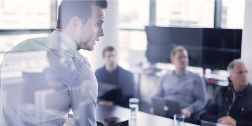 man giving presentation to people on facilitated careers